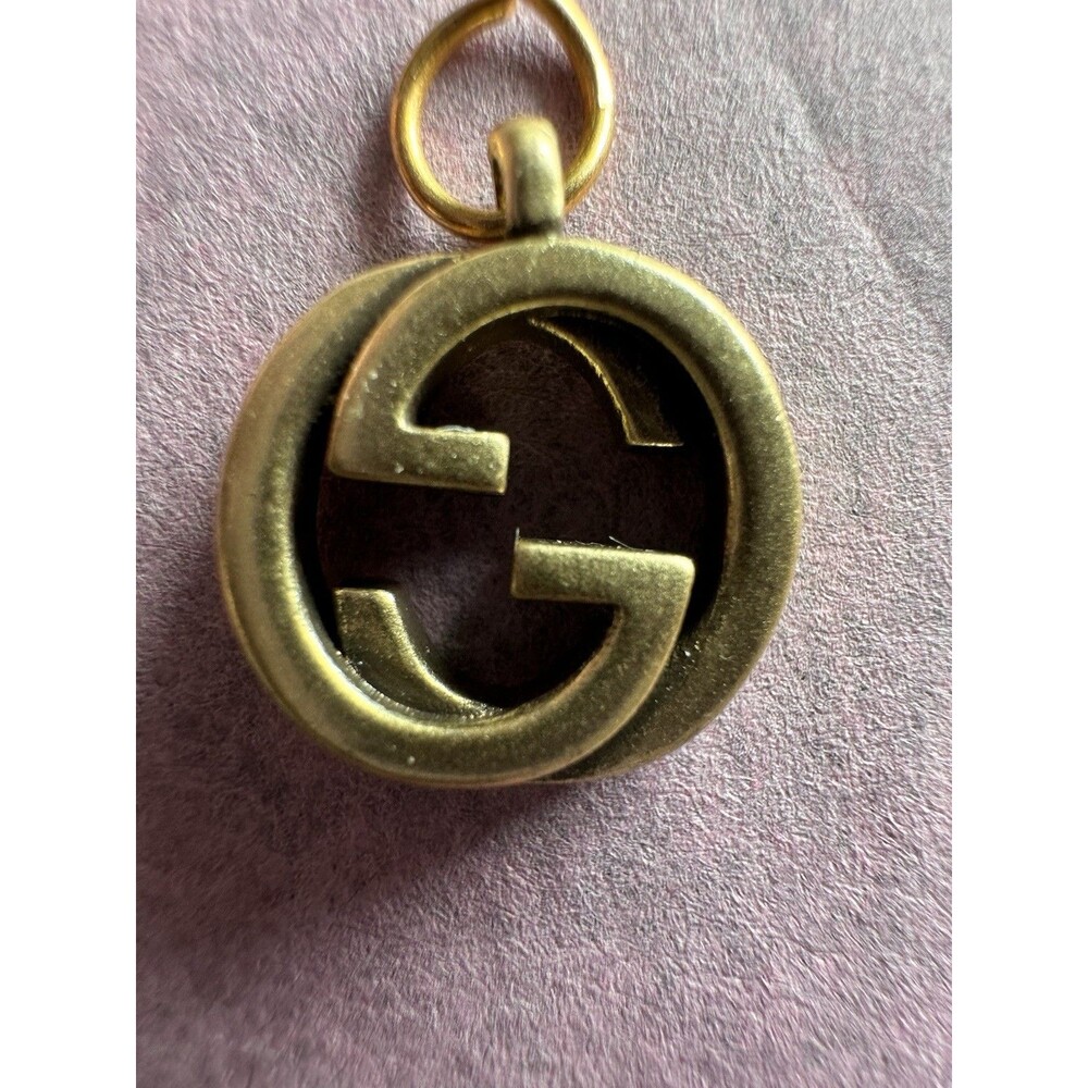 Gucci zipper pull/pendant gold tone